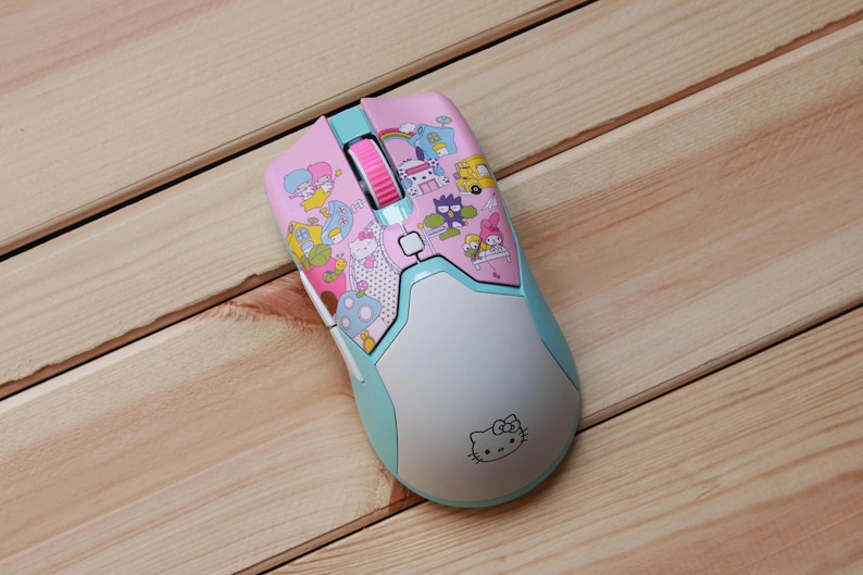 Pink Hello Kitty Razer Viper Mini wireless conversion on a light surface